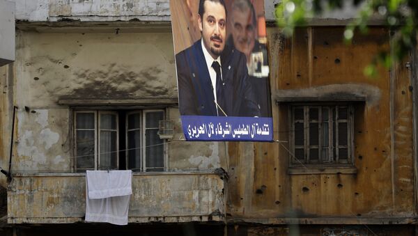 El retrato de Saad Hariri, ex primer ministro del Líbano, en la calle de Beirut - Sputnik Mundo