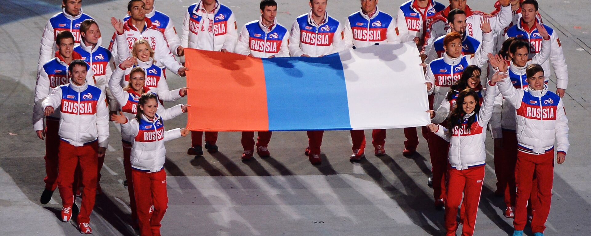 Atletas rusos durante la ceremonia solemne de clausura de los JJOO de Sochi, en 2014  - Sputnik Mundo, 1920, 01.04.2023