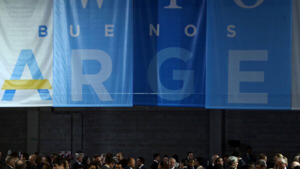 El logo de la cumbre de la OMC en Argentina - Sputnik Mundo