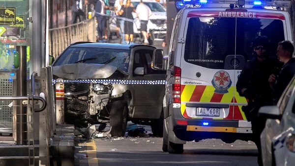 Policía australiana en el lugar del atropello en Melbourne - Sputnik Mundo