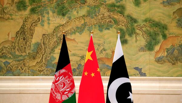 Banderas de Afganistán, China y Pakistán - Sputnik Mundo