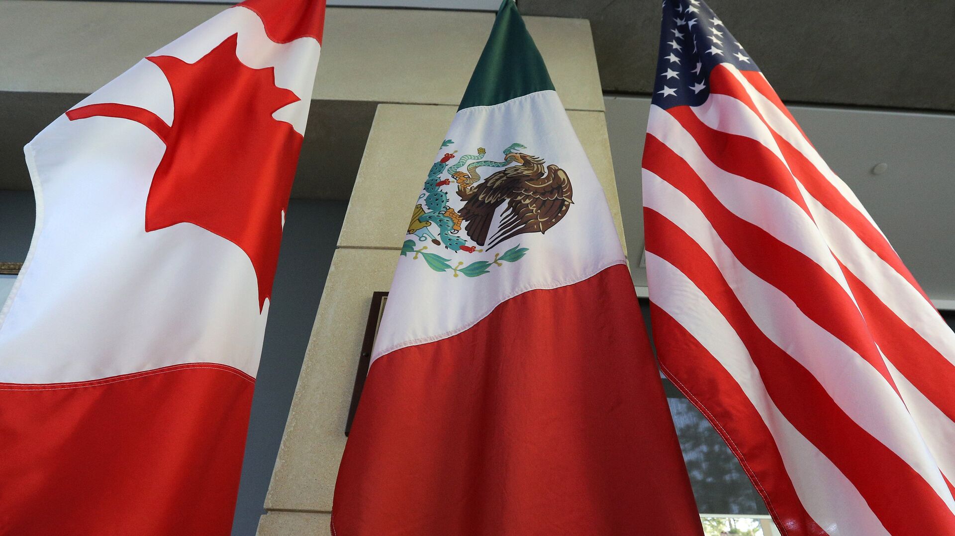 Las banderas de Canadá, México y EEUU - Sputnik Mundo, 1920, 06.12.2021