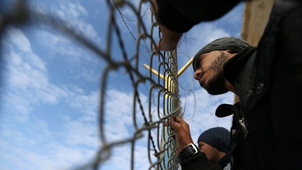 El paso fronterizo de Rafah entre la Franja de Gaza y Egipto - Sputnik Mundo