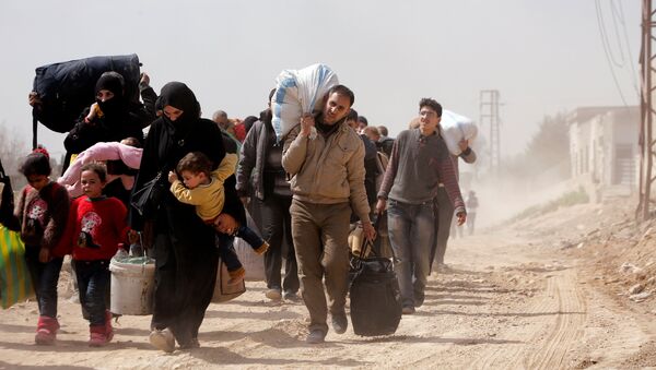 Civiles en Guta Oriental, Siria (archivo) - Sputnik Mundo