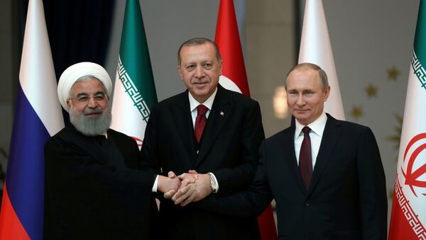 Los presidentes de Irán, Turquía y Rusia, Hasán Rohaní, Recep Tayyip Erdogan y Vladímir Putin - Sputnik Mundo