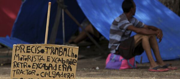 Un migrante venezolano en Brasil Un migrante venezolano en Brasil - Sputnik Mundo