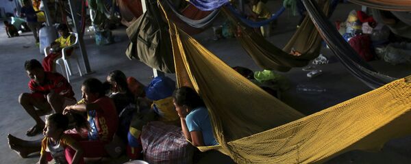 Refugiados venezolanos en Brasil Refugiados venezolanos en Brasil - Sputnik Mundo