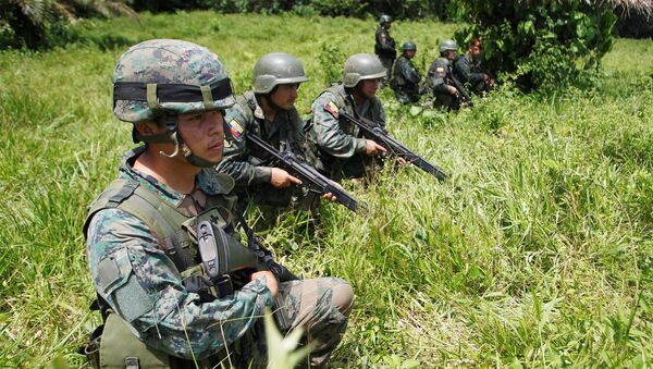 Ecuadorian soldiers guard the border with Ecuador in Narino, Colombia - Sputnik Mundo