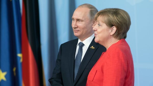 El presidente de Rusia, Vladímir Putin y la canciller de Alemania, Angela Merkel - Sputnik Mundo