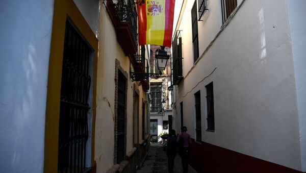 Bandera de España en Sevilla - Sputnik Mundo
