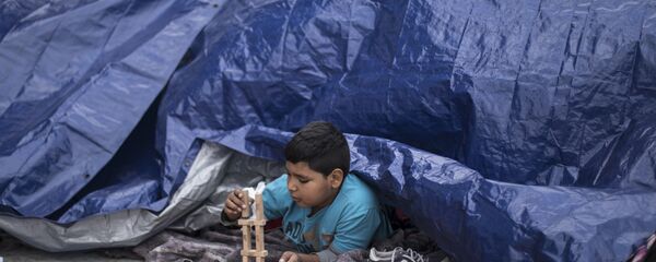 Niños migrantes en México Niños migrantes en México - Sputnik Mundo