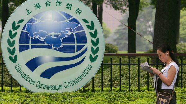 El logo de la Organización de Cooperación de Shanghái (OCS) - Sputnik Mundo