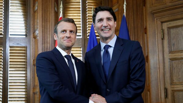 Emmanuel Macron, presidente de Francia, y Justin Trudeau, primer ministro de Canadá - Sputnik Mundo