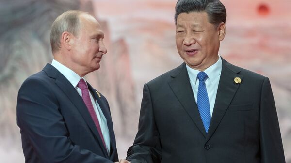 Presidente de Rusia, Vladímir Putin, y presidente de China, Xi Jinping - Sputnik Mundo