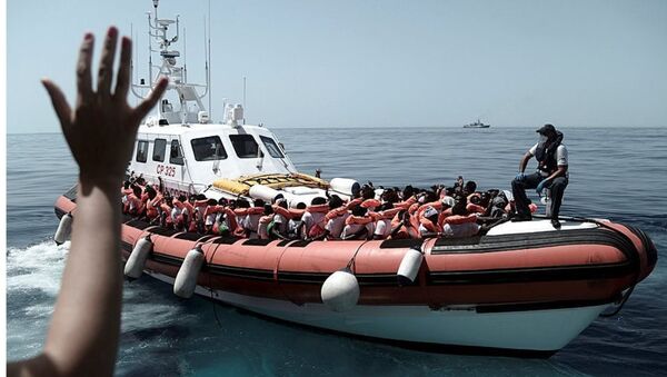 Los migrantes en el barco de rescate Aquarius - Sputnik Mundo