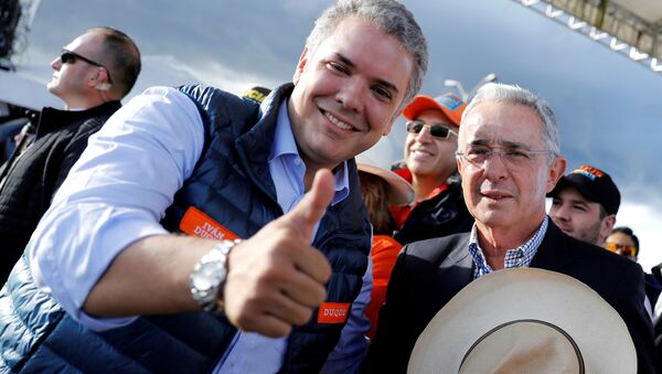 Presidente electo de Colombia Iván Duque y expresidente Álvaro Uribe - Sputnik Mundo