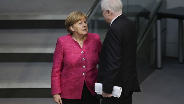 Ángela Merkel, canciller de Alemania, y Horst Seehofer, ministro del Interior y líder de la Unión Social Cristiana de Baviera - Sputnik Mundo