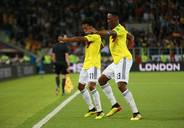 Cuadrado y Mina se alegran por el gol de Colombia Cuadrado y Mina se alegran por el gol de Colombia - Sputnik Mundo
