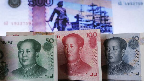 Billetes de yuanes y rublos - Sputnik Mundo