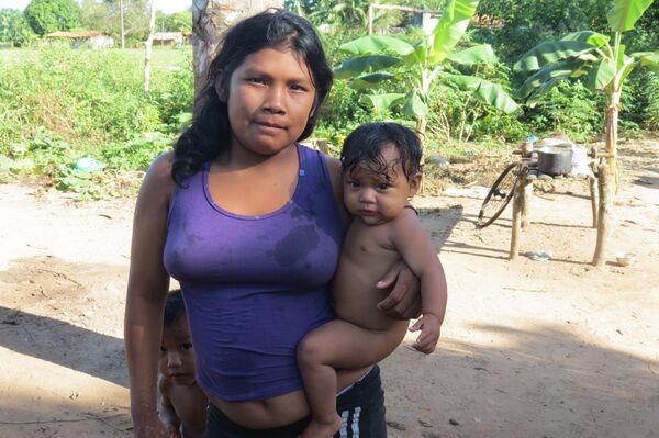 Madre con su niño Madre con su niño - Sputnik Mundo