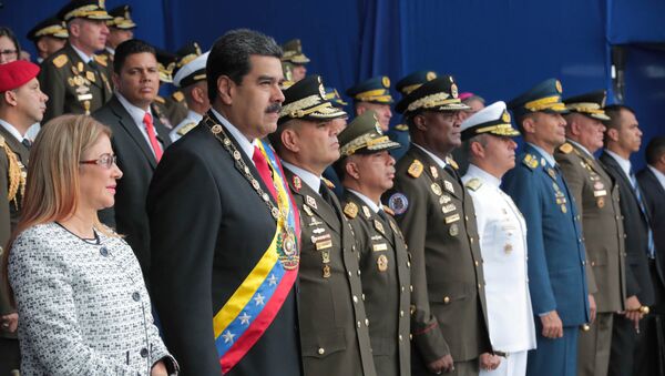 El presidente de Venezuela, Nicolás Maduro, y su esposa, Cilia Flores, asisten a un evento militar en Caracas, Venezuela, el 4 de agosto de 2018. - Sputnik Mundo