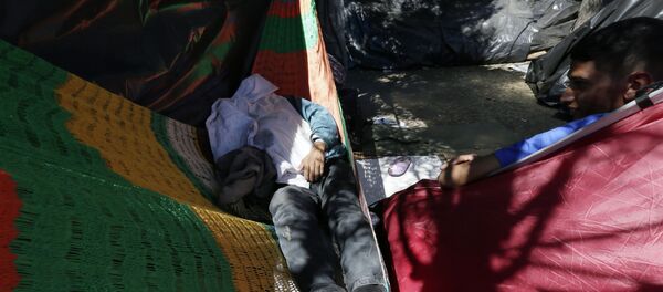 Migrantes venezolanos en Ecuador Migrantes venezolanos en Ecuador - Sputnik Mundo