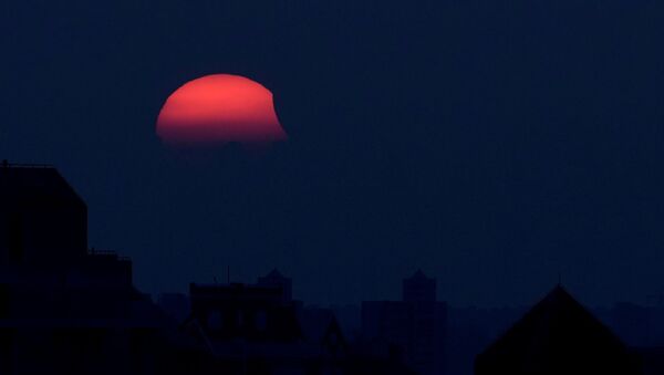 Eclipse solar en China - Sputnik Mundo