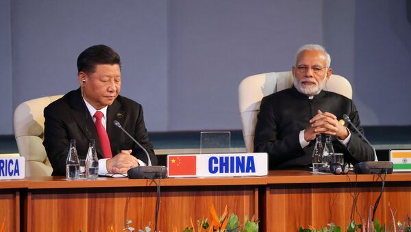 El primer ministro indio, Narendra Modi, y el presidente chino, Xi Jinping - Sputnik Mundo