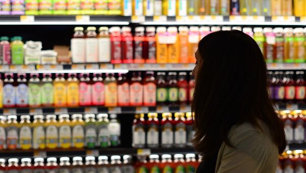Mujer en un supermercado - Sputnik Mundo