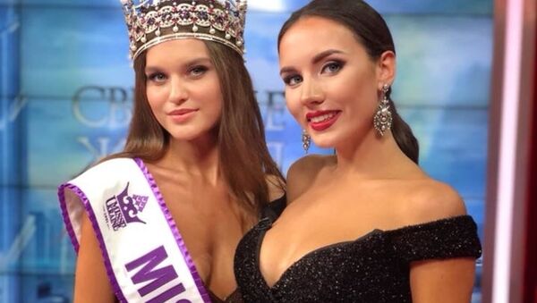 Leonila Guz, nueva Miss Ucrania 2018,  junto con Victoria Kiose, Miss Ucrania 2016 - Sputnik Mundo