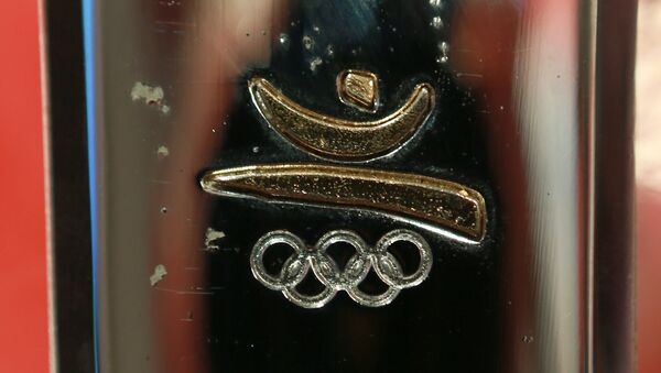 Un símbolo de JJOO de 1992 en Barcelona en la antorcha olímpica (achivo) - Sputnik Mundo