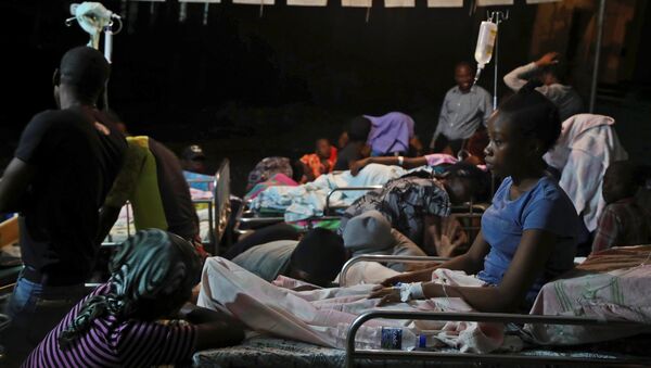 Personas heridas tras el terremoto en Haití - Sputnik Mundo