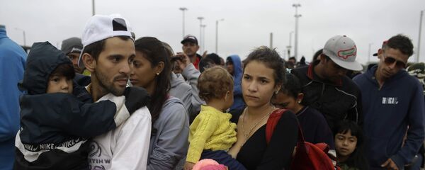 Migrantes venezolanos en Colombia (Archivo) Migrantes venezolanos en Colombia (Archivo) - Sputnik Mundo