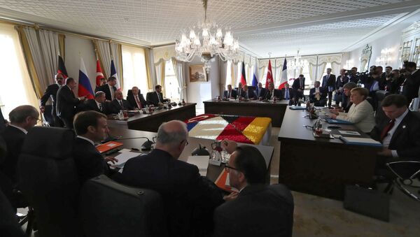 Los líderes de Alemania, Rusia, Turquía y Francia durante la reunion en Estambul - Sputnik Mundo