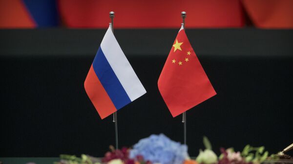 Las banderas de Rusia y China - Sputnik Mundo