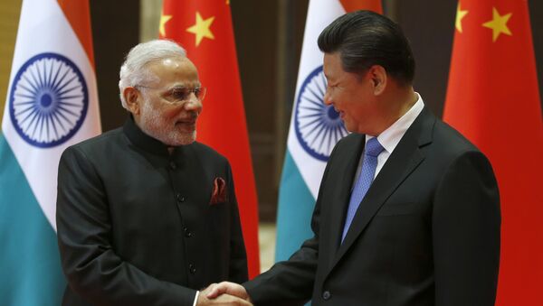 El primer ministro indio, Narendra Modi, y el presidente chino, Xi Jinping - Sputnik Mundo