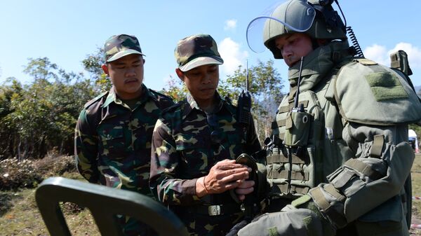 Desminado del territorio de Laos por zapadores rusos - Sputnik Mundo