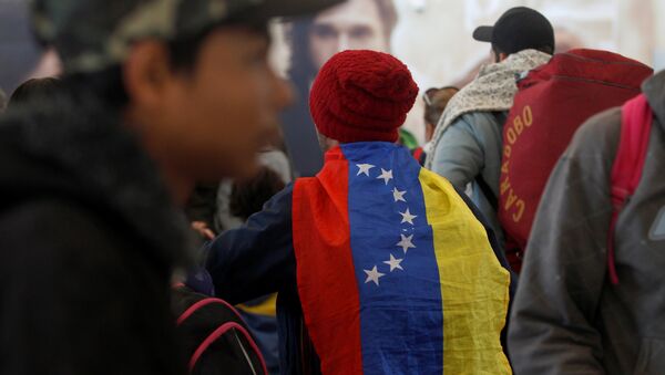 Migrantes venezolanos en Ecuador - Sputnik Mundo