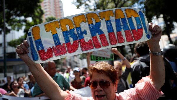 Protestas contra el presidente venezolano, Nicolás Maduro, en Caracas - Sputnik Mundo