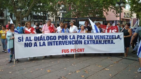 Manifestación Diálogo por la paz para Venezuela, convocada por el Pit-Cnt, el Encuentro Sindical Nuestra América y la Jornada Continental en Defensa de la Democracia y Contra el Neoliberalismo - Sputnik Mundo