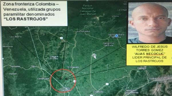 El mapa y la foto de Wilfredo de Jesús Torres Gómez alias 'Necocli', lider principal de los Rastrojos El mapa y la foto de Wilfredo de Jesús Torres Gómez alias 'Necocli', lider principal de los Rastrojos - Sputnik Mundo