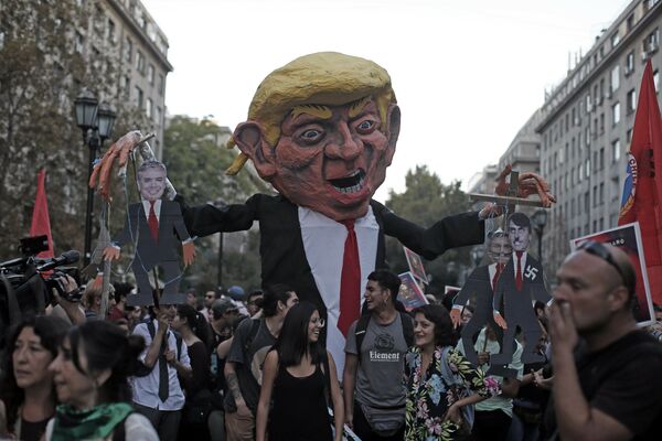 Marcha de protesta en contra del Foro Prosur en Santiago (Chile), el 22 de marzo de 2019 Marcha de protesta en contra del Foro Prosur en Santiago (Chile), el 22 de marzo de 2019 - Sputnik Mundo