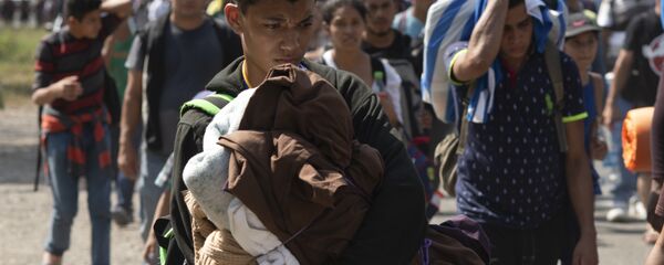 Caravana de migrantes centroamericanos (archivo) Caravana de migrantes centroamericanos (archivo) - Sputnik Mundo