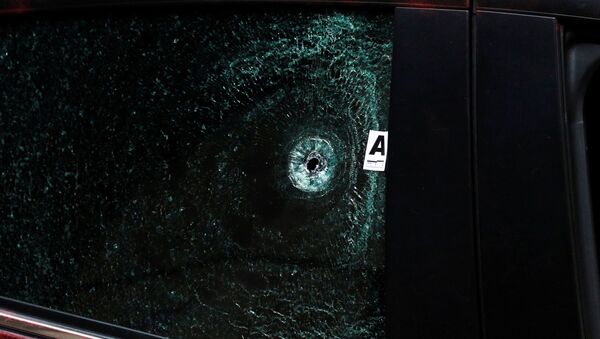 Disparo en el vidrio de un automóvil en México - Sputnik Mundo