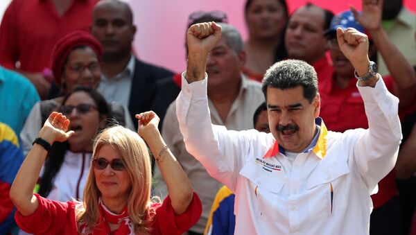El presidente de Venezuela, Nicolás Maduro, junto a su mujer, Cilia Flores - Sputnik Mundo