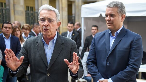El expresidente de Colombia, Álvaro Uribe, junto al actual mandatario, Iván Duque - Sputnik Mundo