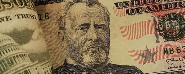 Un dólar (imagen referencial) Un dólar (imagen referencial) - Sputnik Mundo