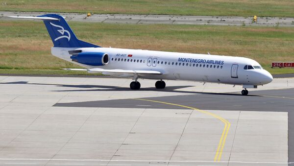 Un avión de la compañía aérea Montenegro Airlines (imagen referencial) - Sputnik Mundo