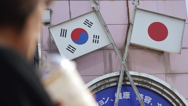 Banderas de Corea del Sur y Japón - Sputnik Mundo