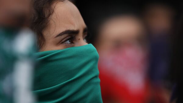 Participante de la marcha feminista en Ciudad de México - Sputnik Mundo